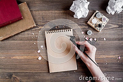 Writer workplace with tools on wooden background top view Stock Photo