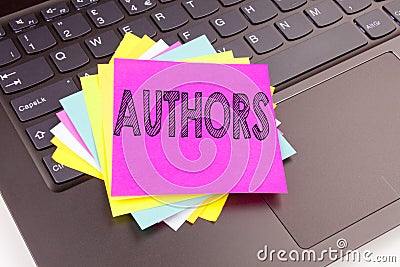 Writing Authors text made in the office close-up on laptop computer keyboard. Business concept for Word Message Text Typography Wo Stock Photo
