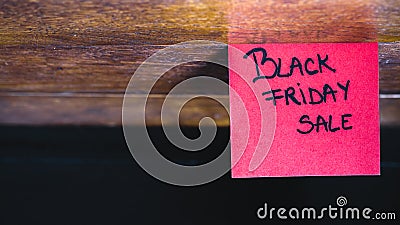 Writing black Friday sale on memo post reminder. Text on sticky paper Stock Photo