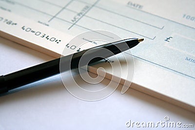 Writing a Cheque Stock Photo