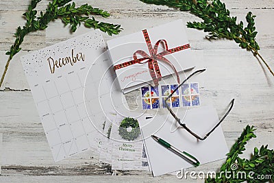 Writing Christmas cards to friends and family Editorial Stock Photo