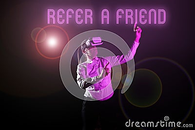 Writing displaying text Refer A Friend. Internet Concept Recommendation Appoint someone qualified for the task Frame Stock Photo