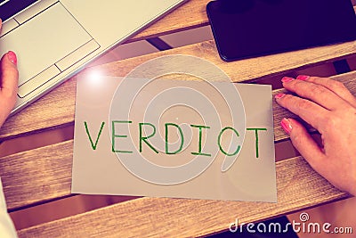 Writing displaying text Verdict. Business overview decision on disputed issue in a civil or criminal case or inquest Stock Photo