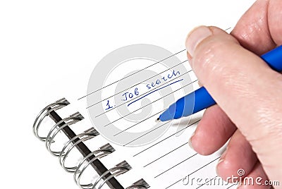 Writing down a job search plan Stock Photo