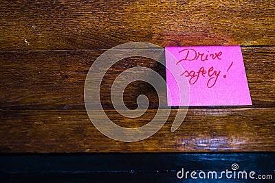 Writing Drive safely on memo post reminder. Text Drive safely on sticky paper Stock Photo