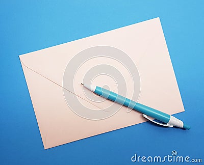 Writing a letter. Time for writing a letter. Letter and pencil. Stock Photo