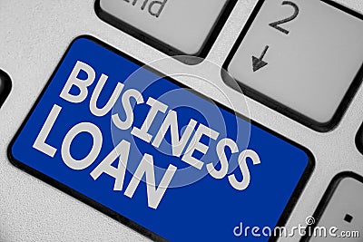 Writing note showing Business Loan. Business photo showcasing Credit Mortgage Financial Assistance Cash Advances Debt Keyboard blu Stock Photo