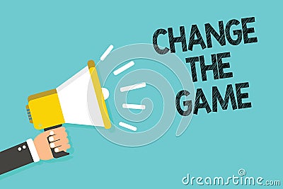 Writing note showing Change The Game. Business photo showcasing Make a movement do something different new strategies Man holding Stock Photo