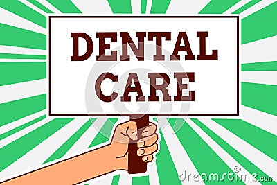 Writing note showing Dental Care. Business photo showcasing maintenance of healthy teeth or to keep it clean for future Man hand h Stock Photo