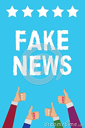 Writing note showing Fake News. Business photo showcasing Giving information to people that is not true by the media Men women han Stock Photo