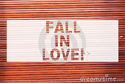 Writing note showing Fall In Love. Business photo showcasing Feeling loving emotions about someone else Roanalysisce Happiness Stock Photo