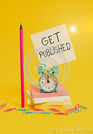 Writing note showing Get Published. Business photo showcasing make material and literature available for the public to view Alarm Stock Photo