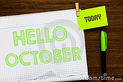 Writing note showing Hello October. Business photo showcasing Last Quarter Tenth Month 30days Season Greeting Open notebook page m Stock Photo