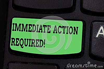 Writing note showing Immediate Action Required. Business photo showcasing address the alert that popped up on you system Keyboard Stock Photo