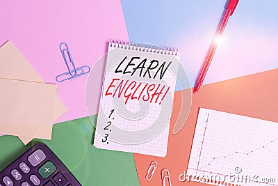 Writing note showing Learn English. Business photo showcasing gain acquire knowledge in new language by study Office appliance Stock Photo