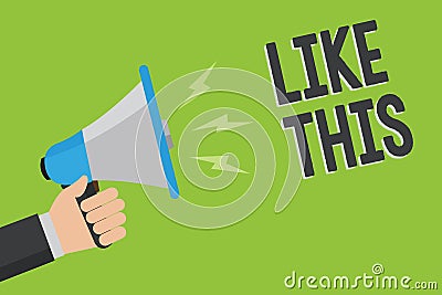Writing note showing Like This. Business photo showcasing An action refering to something that needs to do the same as it is Man h Stock Photo