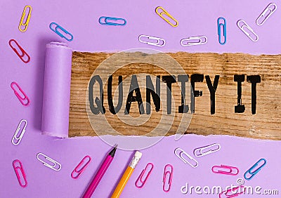 Writing note showing Quantify It. Business photo showcasing Measure the size or amount of something and express in Stock Photo