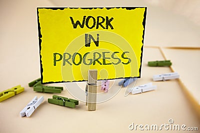 Writing note showing Work In Progress. Business photo showcasing People is working right know to deliver expected results written Stock Photo