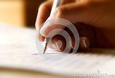 Writing with a pen Stock Photo