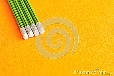 Writing pencils with erasers at the tip Stock Photo