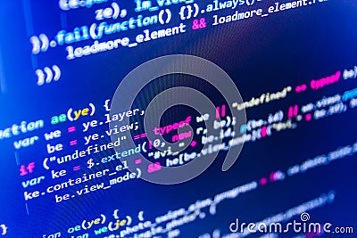 Writing programming code on laptop. Binary digits code editing. Computer program preview. Stock Photo