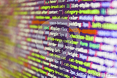 Writing programming functions on laptop. IT coding on monitor screen. SEO concepts for better SERP. Stock Photo