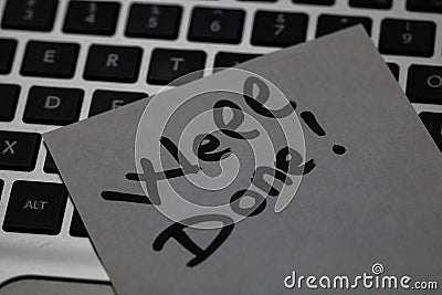 Writing on sticky note Well done! Text with Well done! on paper. Sticky note on keyboard Editorial Stock Photo