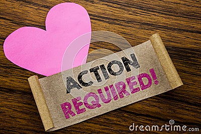 Writing text showing Action Required. Business concept for Immediate Urgent written on sticky note paper, wooden wood background. Stock Photo