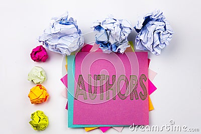 Writing text showing Authors written on sticky note in office with paper balls. Business concept for Word Message Text Typog Stock Photo