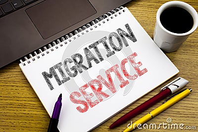 Writing text showing Migration Service. Business concept for Online Network Idea written on notebook book on the wooden background Stock Photo