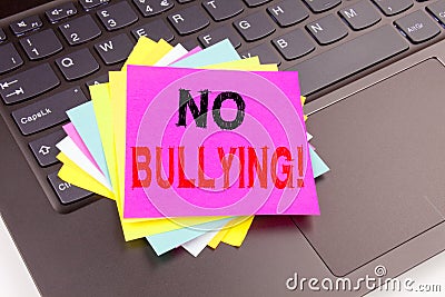 Writing text showing No Bullying made in the office with surroundings such as laptop, marker, pen. Business concept for Bullies Pr Stock Photo