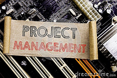 Writing text showing Project Management. Business concept for Strategy Plan Goals Written on sticky note, computer main board back Stock Photo