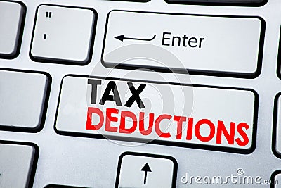 Writing text showing Tax Deductions. Business concept for Finance Incoming Tax Money Deduction written on white keyboard key with Stock Photo