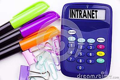 Writing word Intranet word cloud text in the office with surroundings such as marker, pen writing on calculator. Business concept Stock Photo