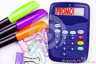 Writing word Promo text in the office with surroundings such as marker, pen writing on calculator. Business concept for Promo Sale Stock Photo