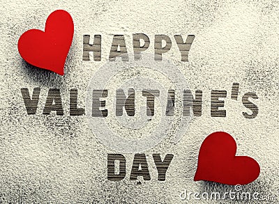 Written in icing sugar : Happy Valentine's Day Stock Photo