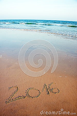 2016 written in sand on tropical beach Stock Photo