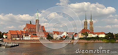 Wroclaw cityscape with Church of the Holy Cross and St. Bartholomew and Cathedral of St John the Baptist with river Odra in Stock Photo