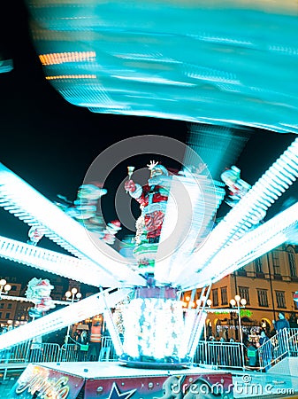 Santa claus statue on carousel on christmas fair Editorial Stock Photo