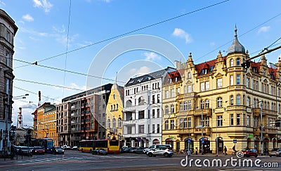 Wroclaw modern cityscape with wide streets and traditional historical tenement houses in sunny spring day, Poland Stock Photo