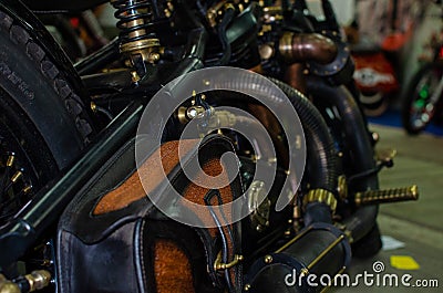 WROCLAW, POLAND - August 11, 2019: USA cars show: Fragment of vintage stylish black and copper coloured engine with exhaust Editorial Stock Photo