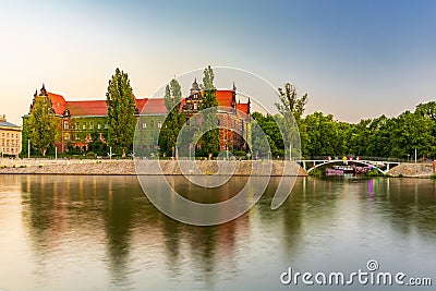 Beautiful and colorful facade of National Museum full of ivy next to promenade over the Odra river Editorial Stock Photo