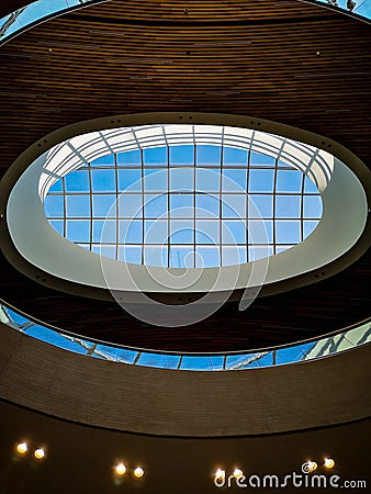 Looking up to ceiling and round skylight of shopping mall Editorial Stock Photo