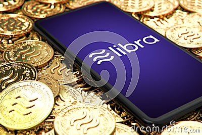 WROCLAW, POLAND - JUNE 20th, 2019: Facebook announces Libra cryptocurrency. Smartphone withLibra logo on the screen is laying down Editorial Stock Photo