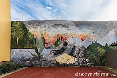 Small square with colorful mural street art paintings of fantasy and abstract art with Editorial Stock Photo