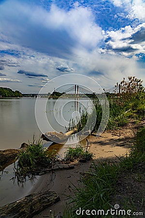 Beautiful landscape from coast of flowing Odra river from Millennium bridge side with trees and Editorial Stock Photo