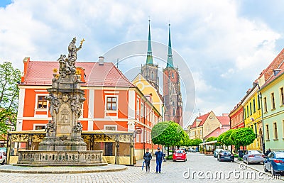 Wroclaw, Poland, May 7, 2019: Monument on square and cobblestone road street Editorial Stock Photo