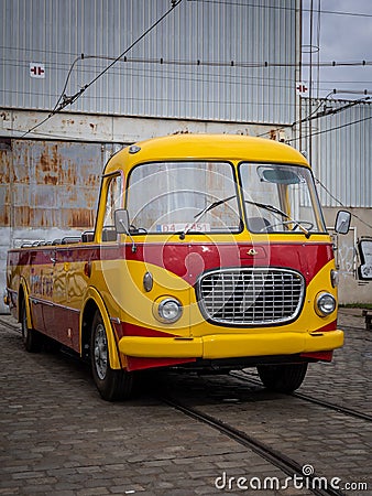 An empty, vintage cabrio Skoda bus in front of the depot. Editorial Stock Photo