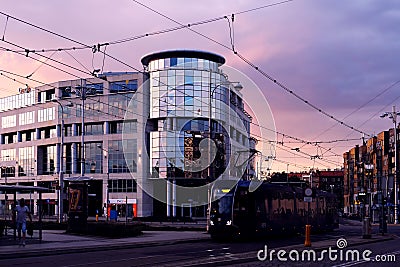 Wroclaw, Poland. 08/28/2020 tram arriving at a bus stop in front of a modern office building Bema Plaza at Bema Street Editorial Stock Photo