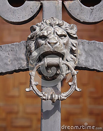 Wrought Iron Door with Lion knocker Stock Photo